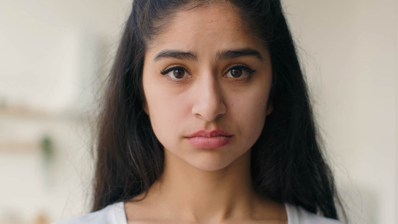 Young woman looking sad and upset