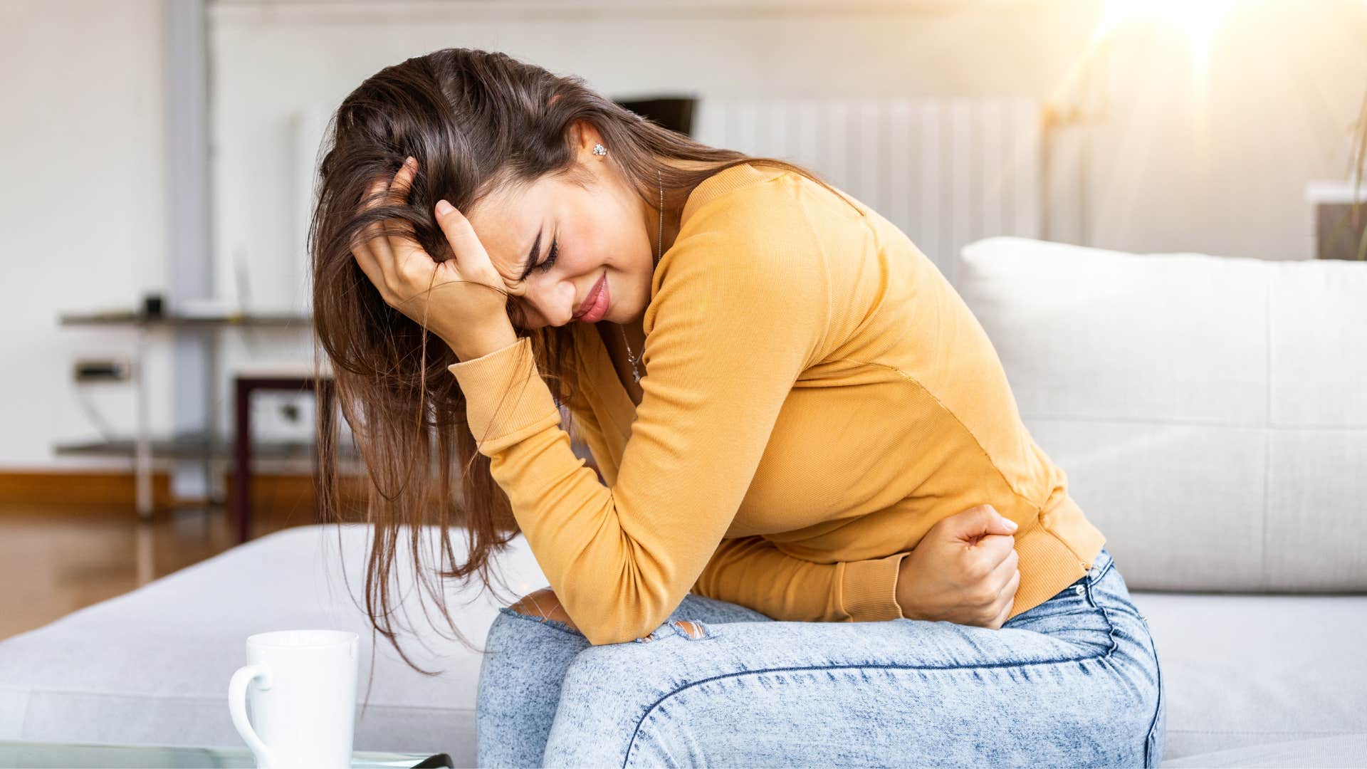 empathic woman experiencing someone's physical feelings