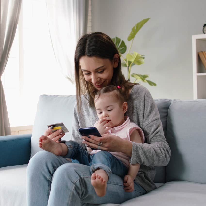 Single mom spending money on her daughter