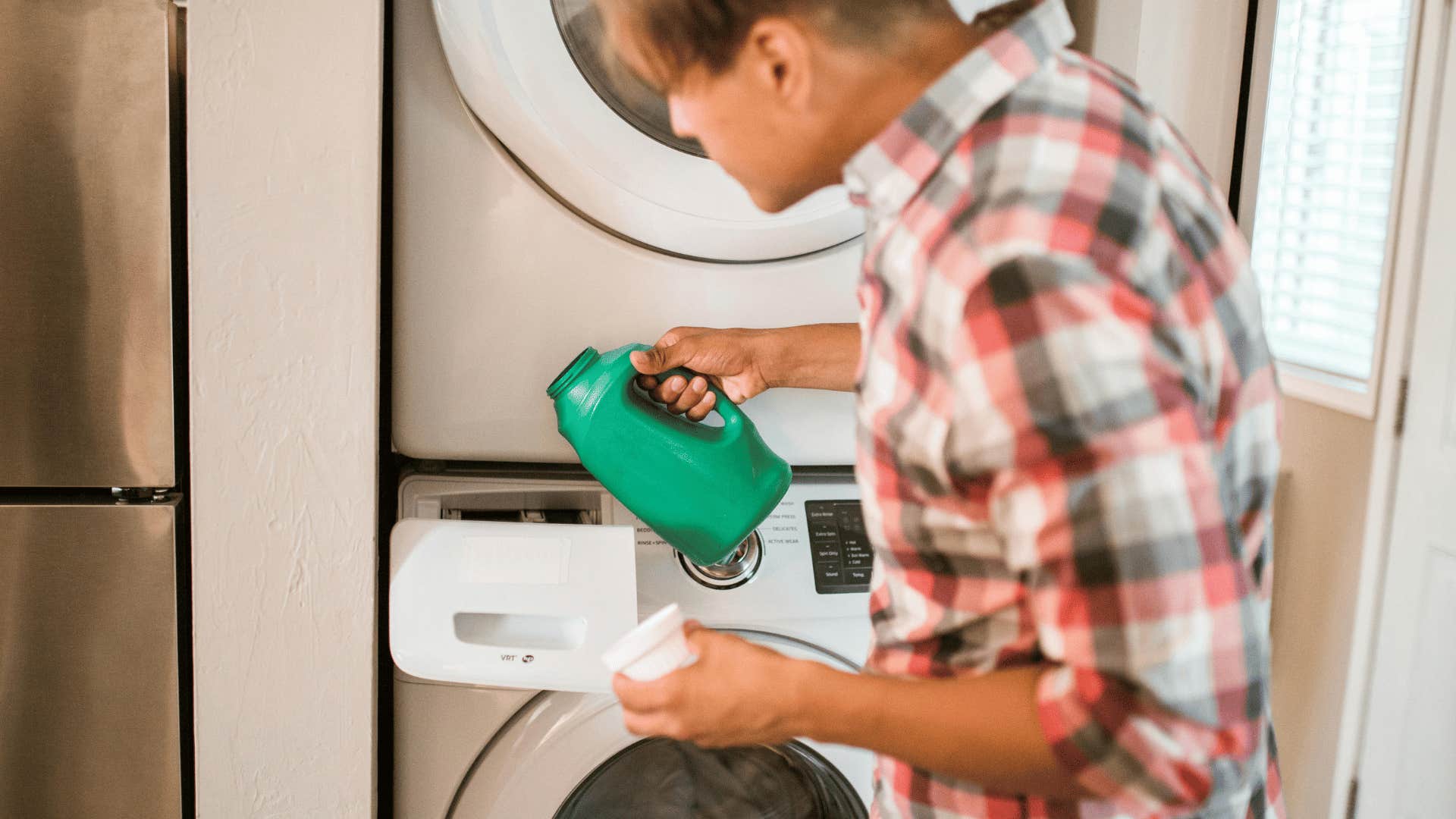 man doing laundry