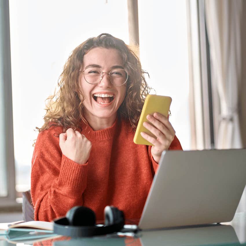 smiling young woman excited