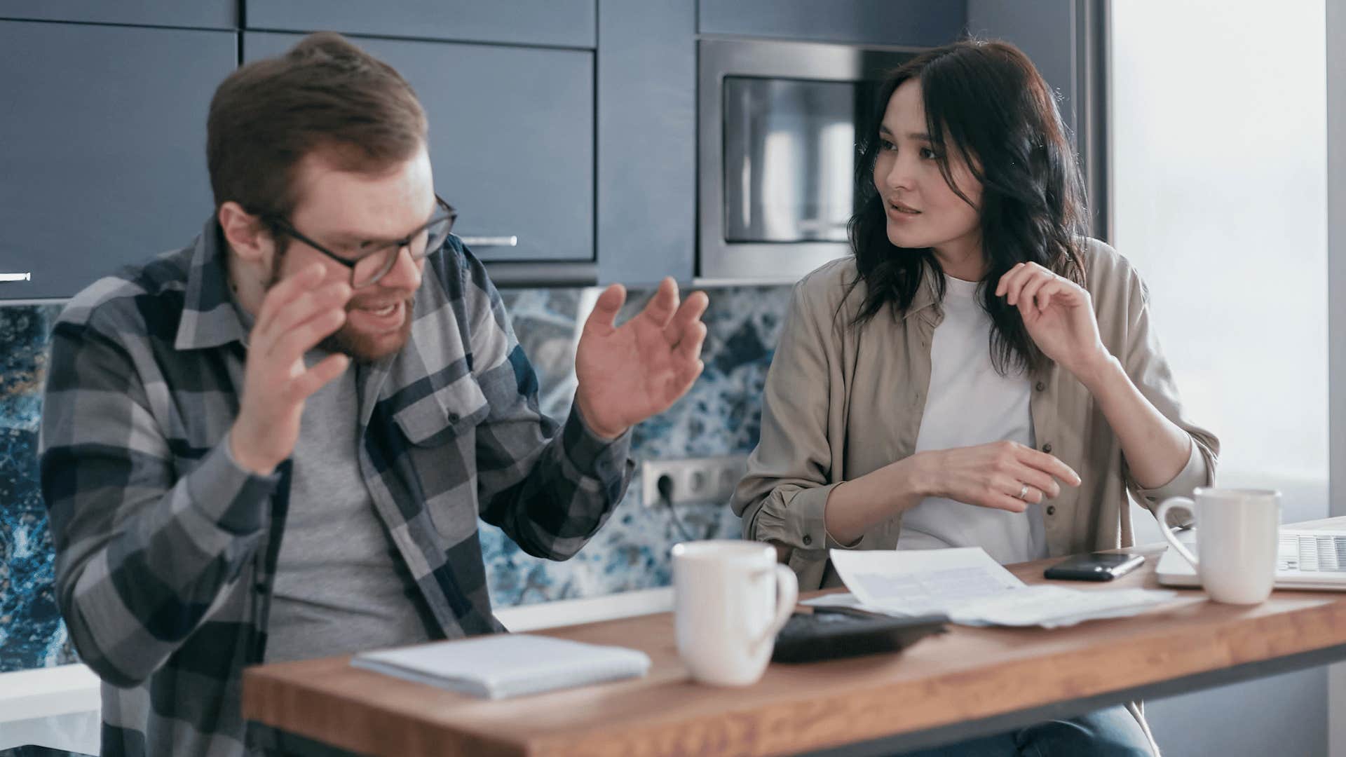 couple arguing at table