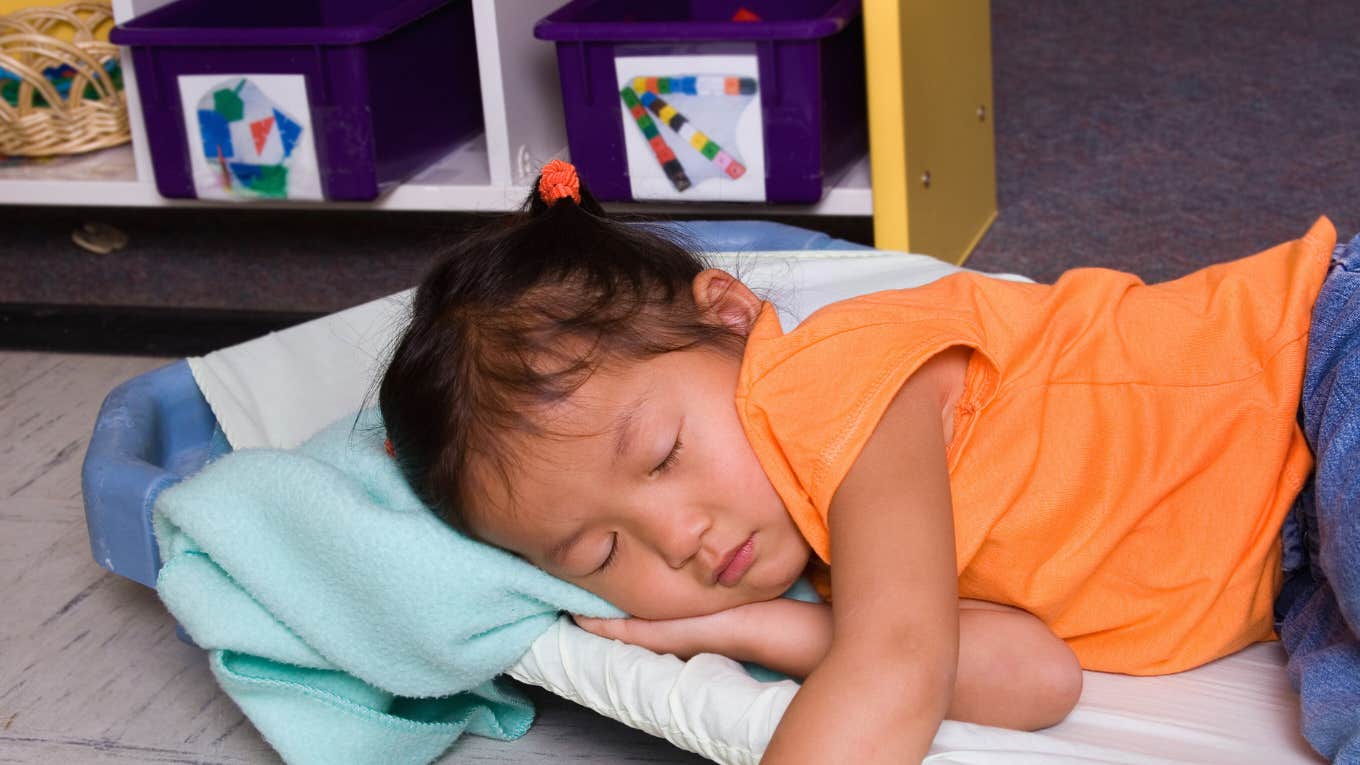 child sleeping at preschool