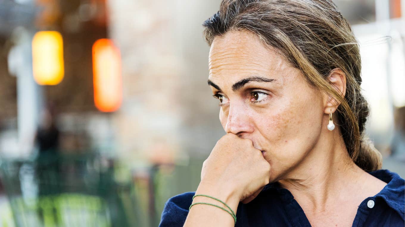 Woman deep in thought, having emotional affair.