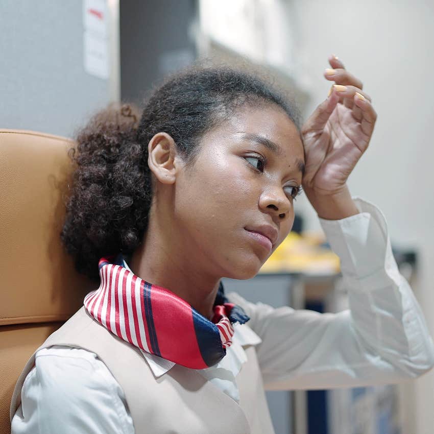 Stressed flight attendant