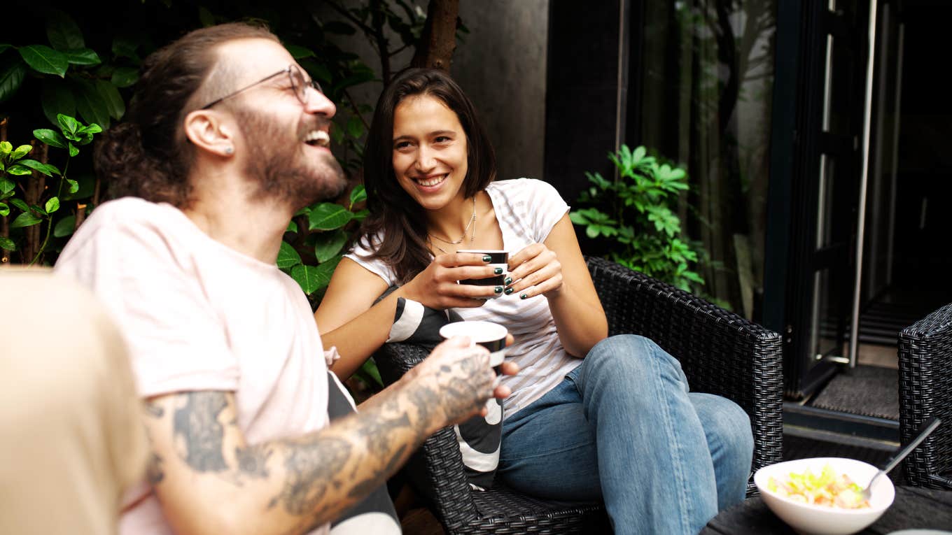 Independent woman admiring mans qualities over coffee. 