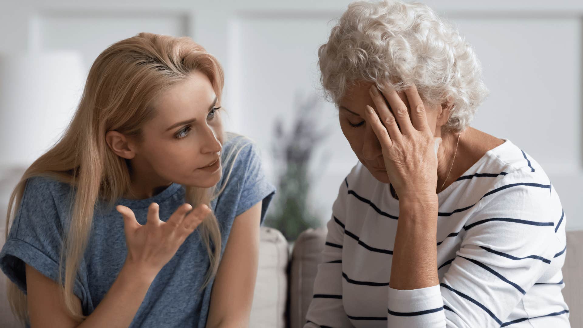 younger woman arguing with older woman 