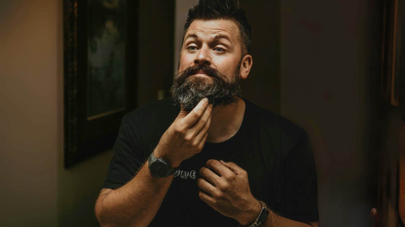 Masculine man grooming beard, self care. 