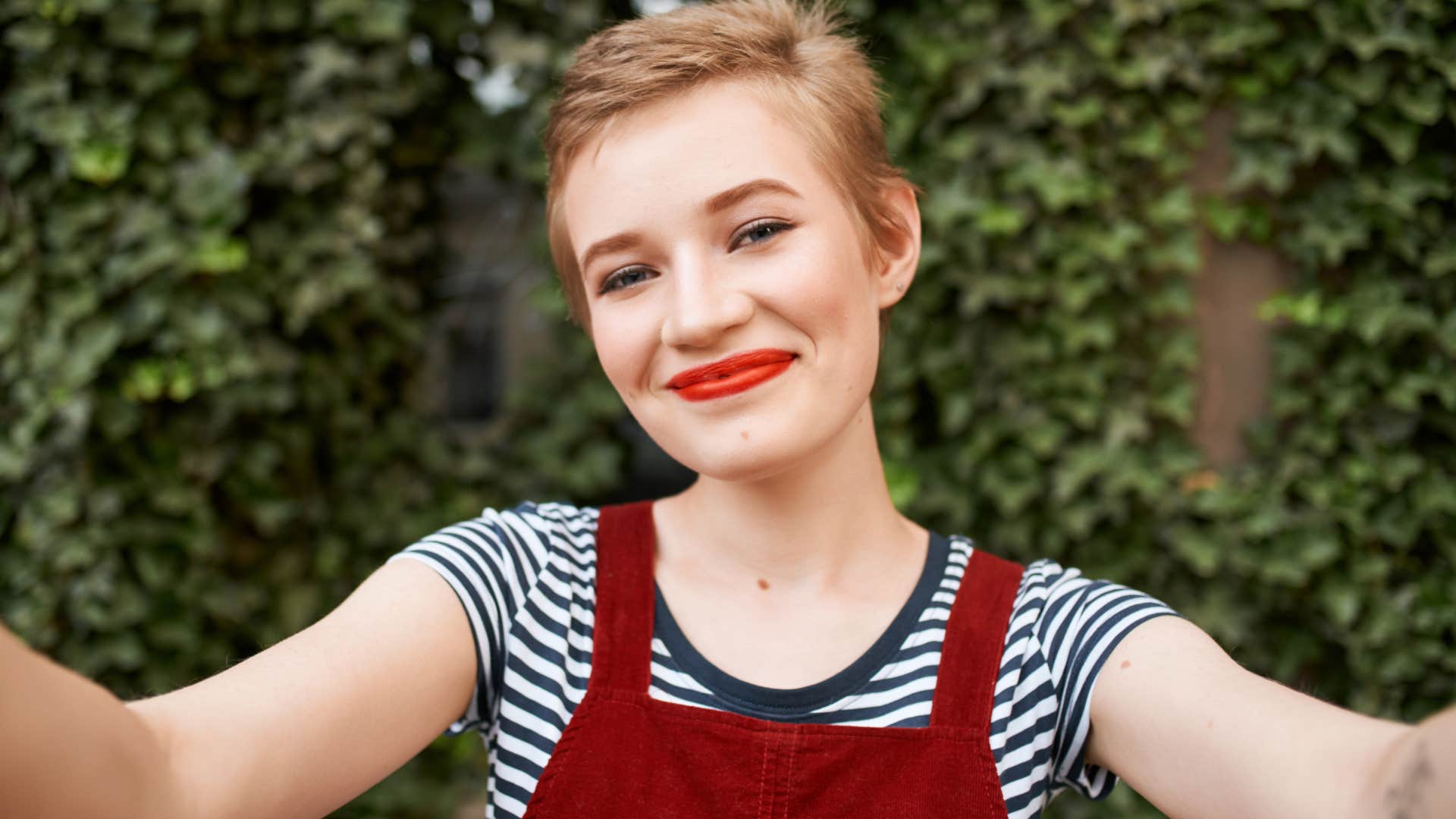 hyper-independent woman smiling and looking confident