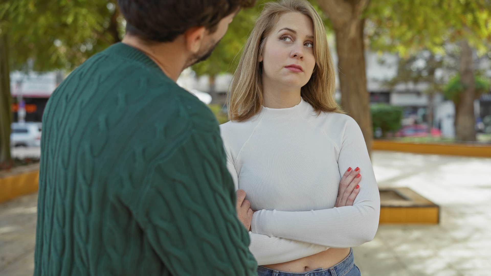 Woman looking skeptical next to a man