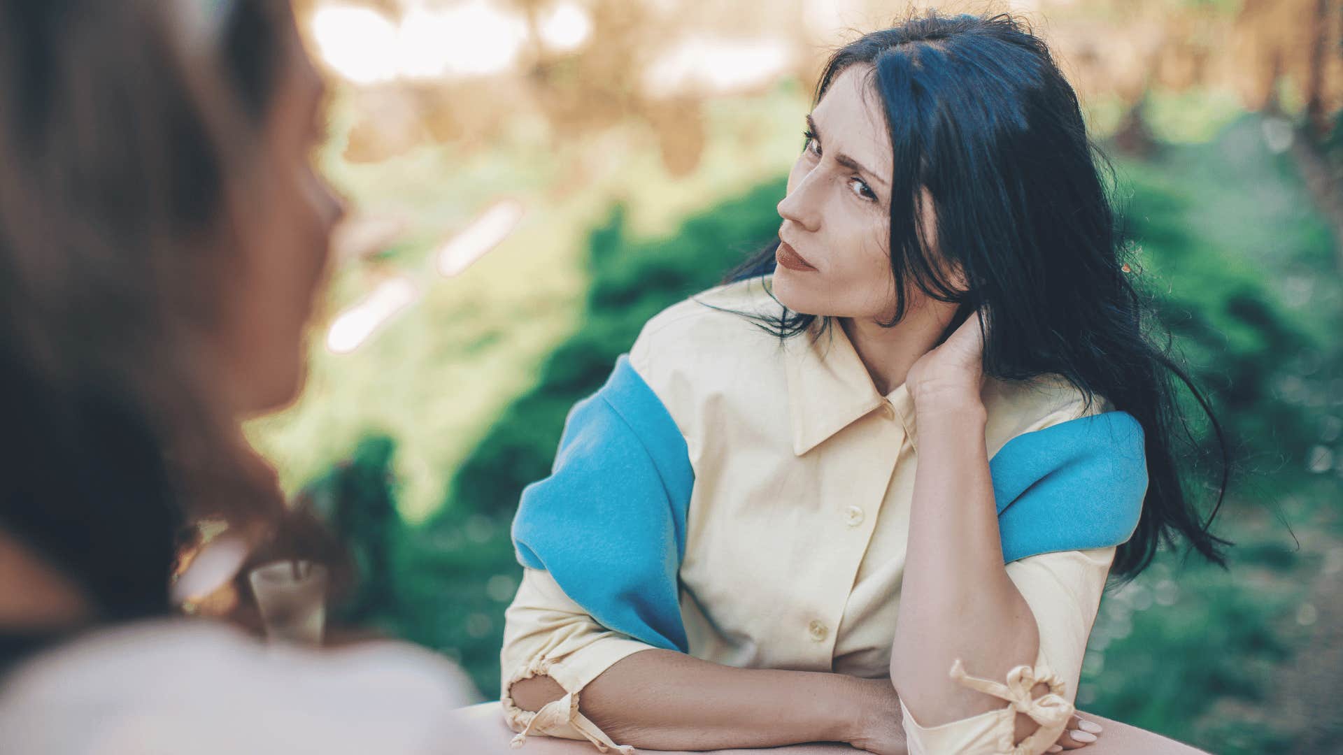 woman talking to another woman