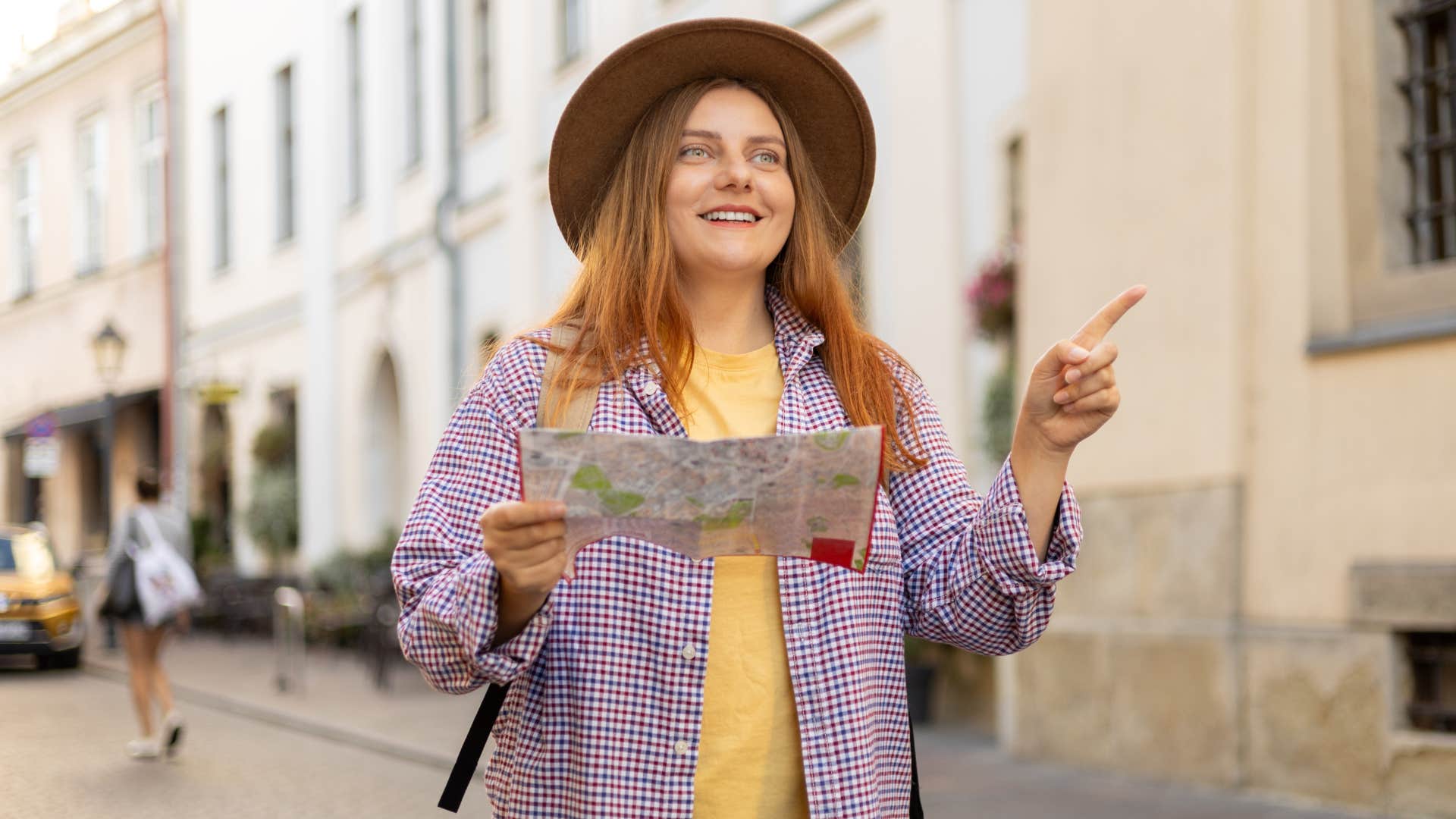 Woman who doesn't know life skill of reading a map