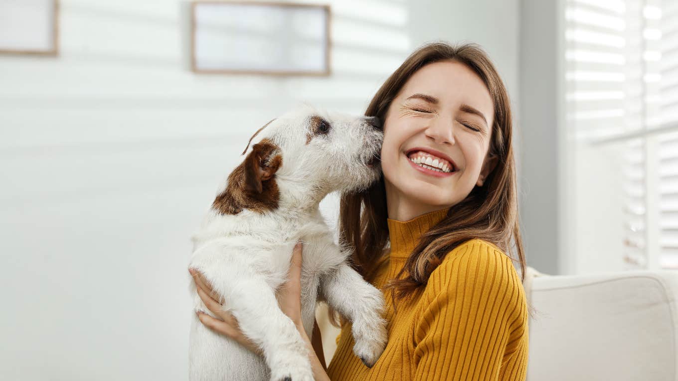 Dog showing love to their owner