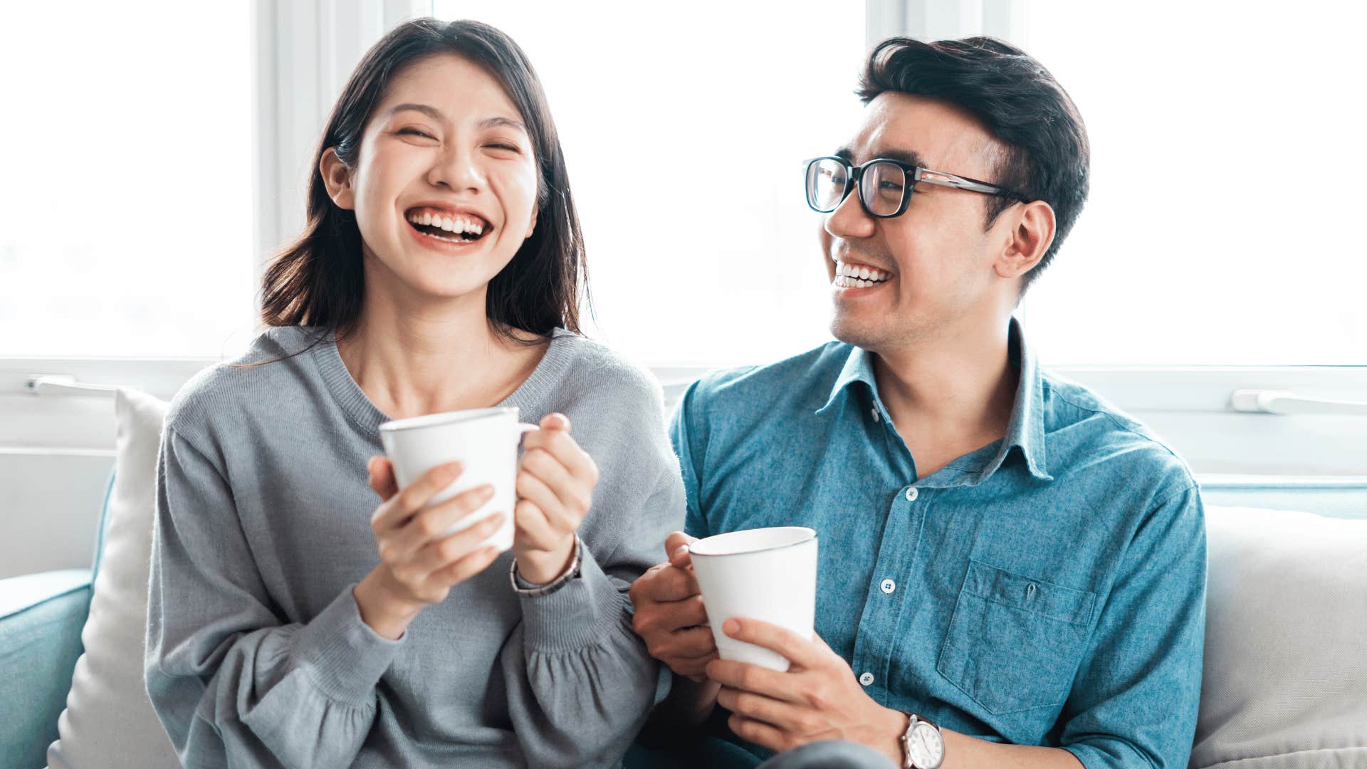 man and woman drinking coffee