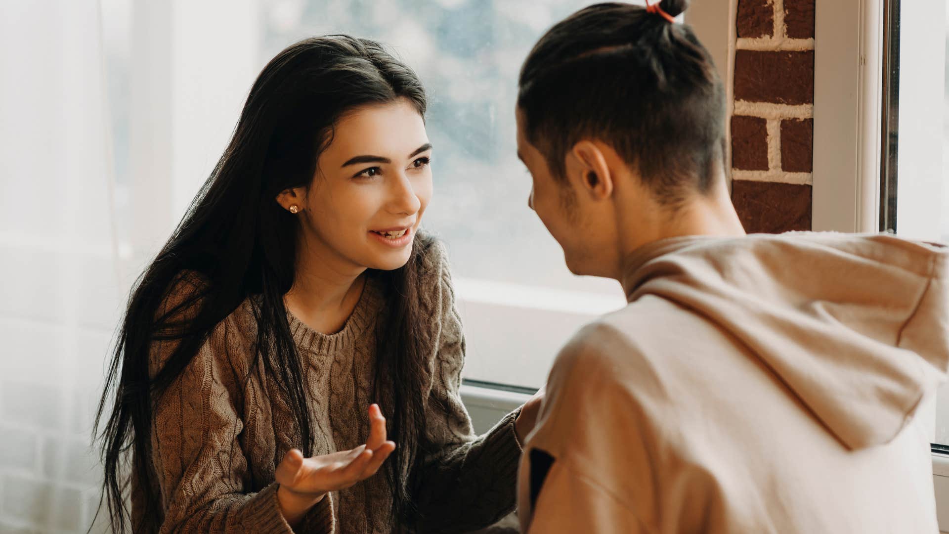 Couple intently talking to each other