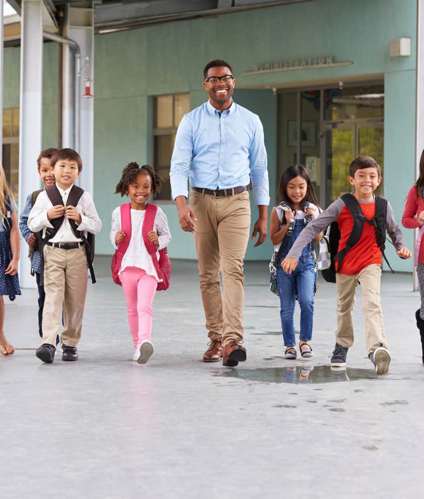 Teacher worried about absent student walking with kids