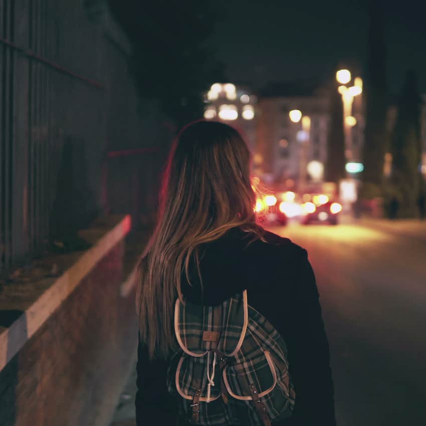 Teen girl walking alone at night