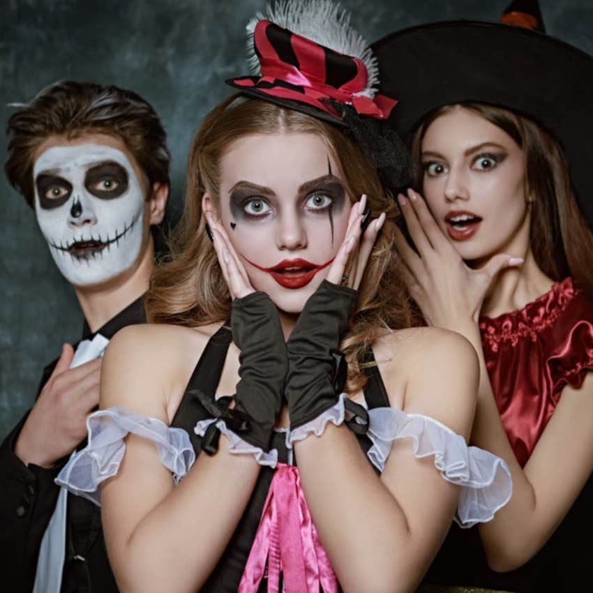 teenagers wearing halloween costumes