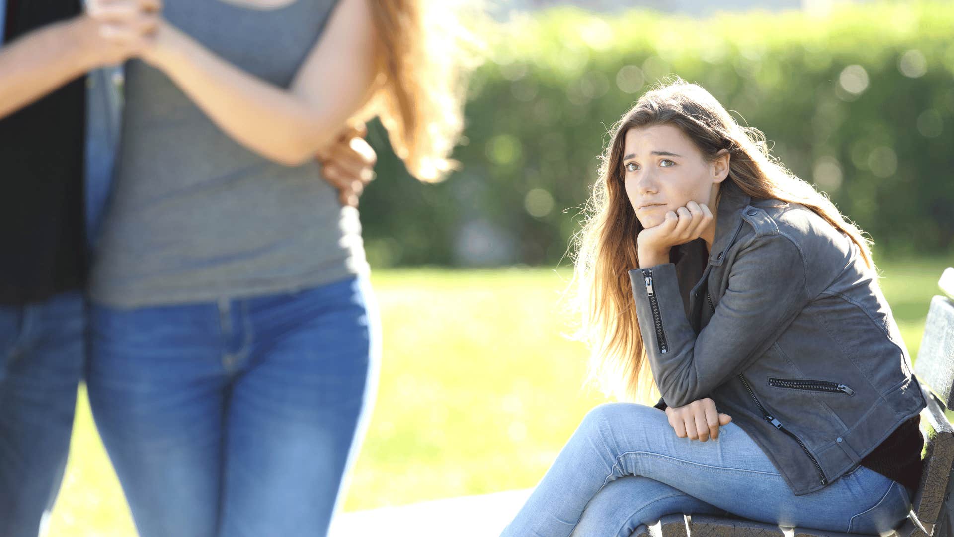 lonely woman noticing couples