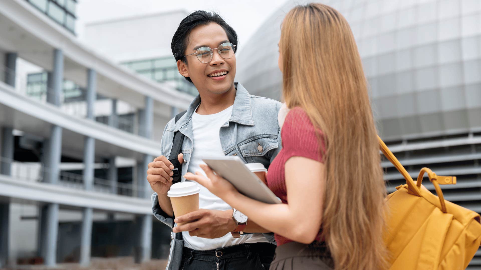 man listening as woman talks