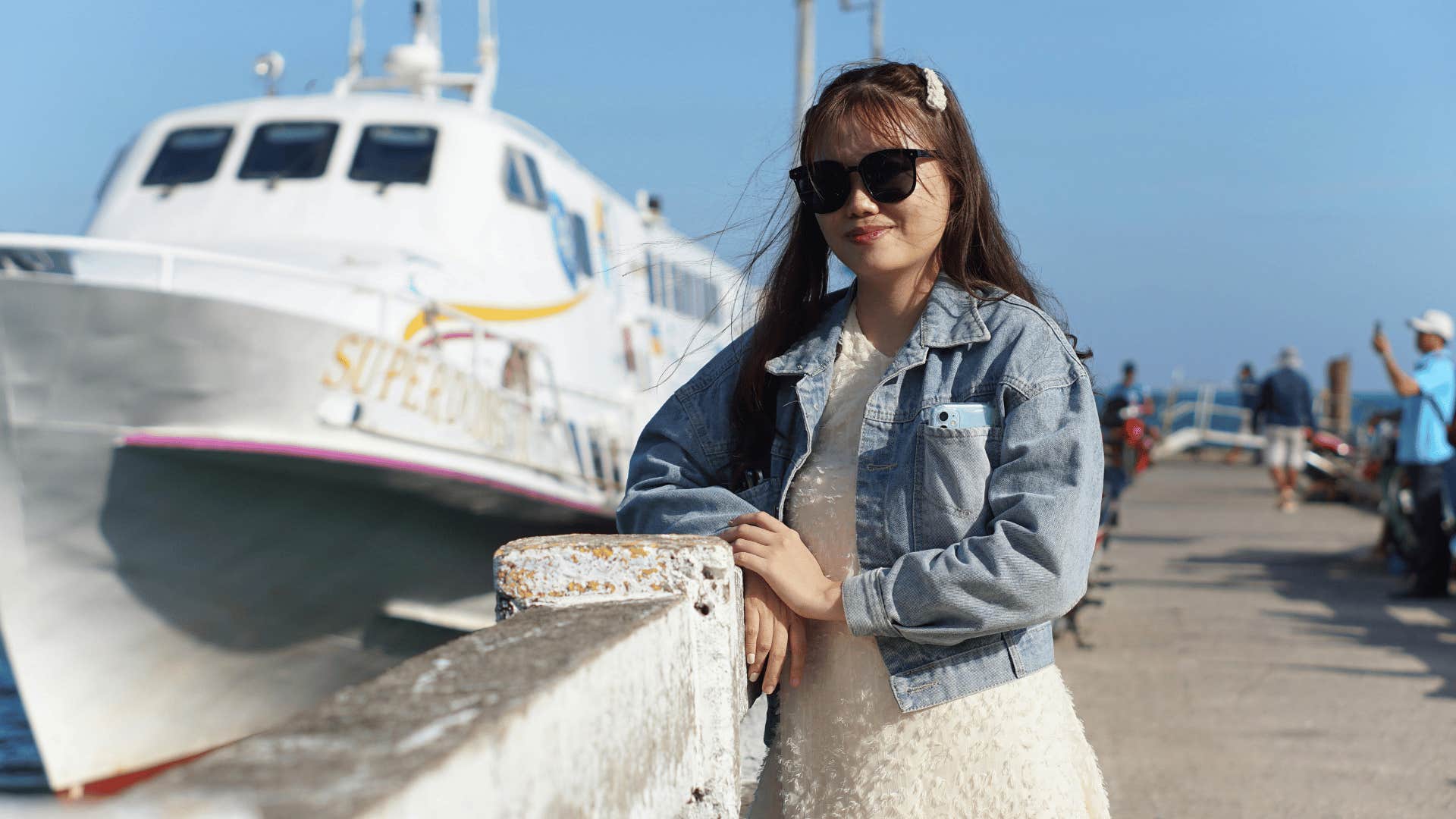 woman smiling on dock