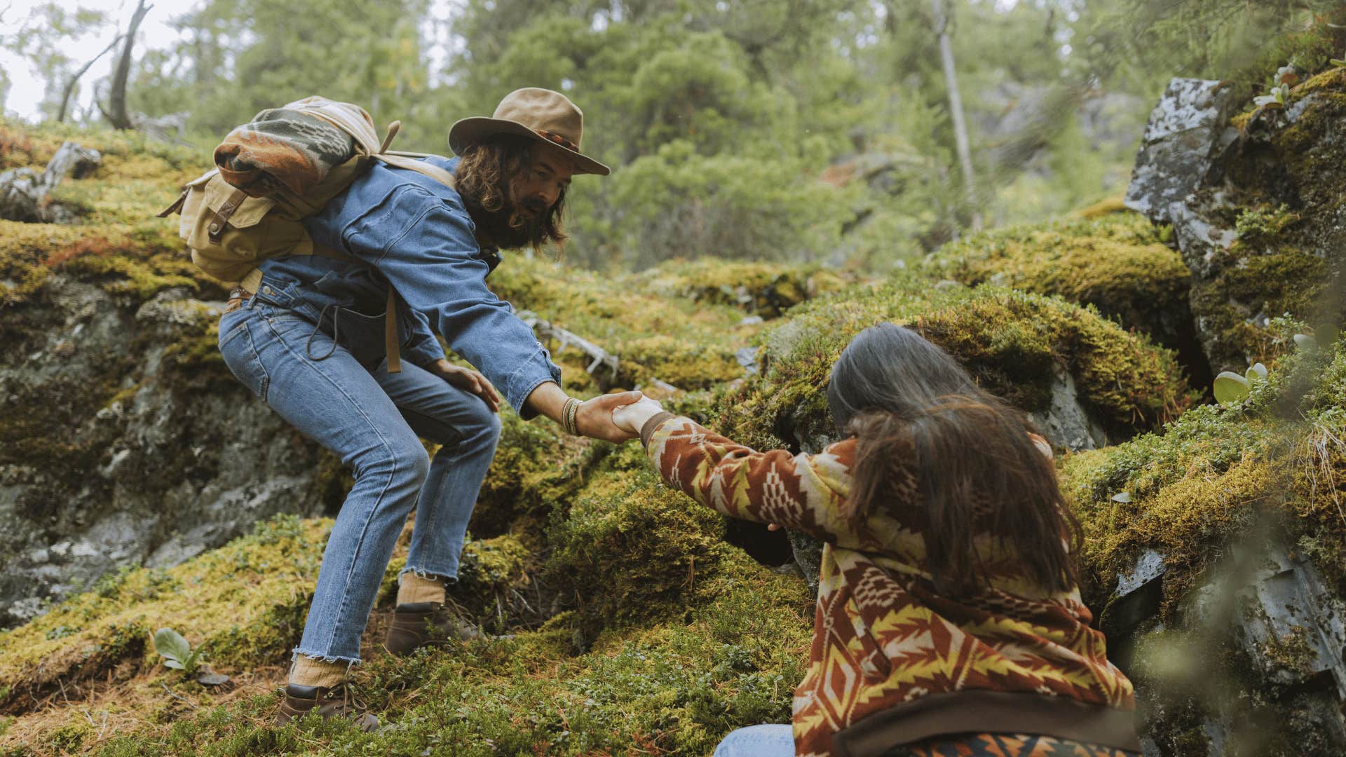 woman asking for help up mountain