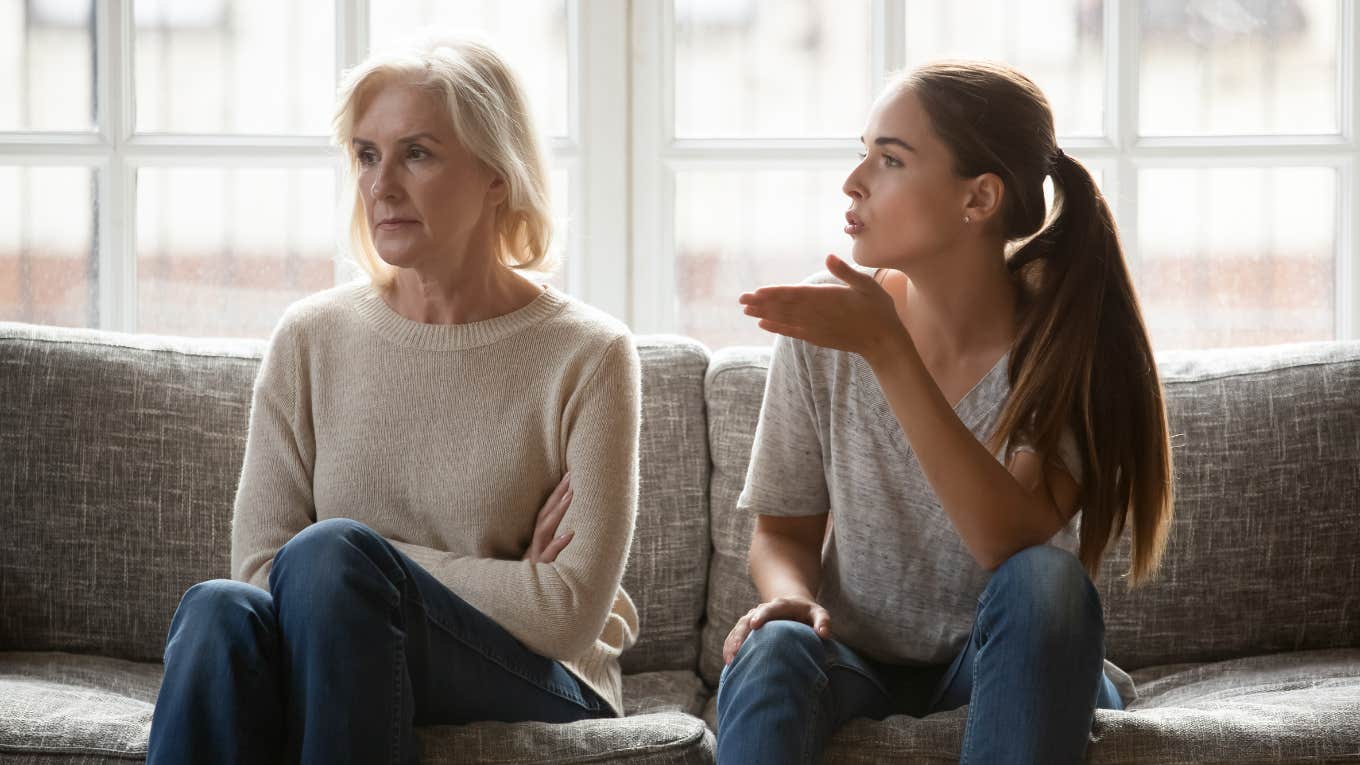 adult woman yelling at older mother