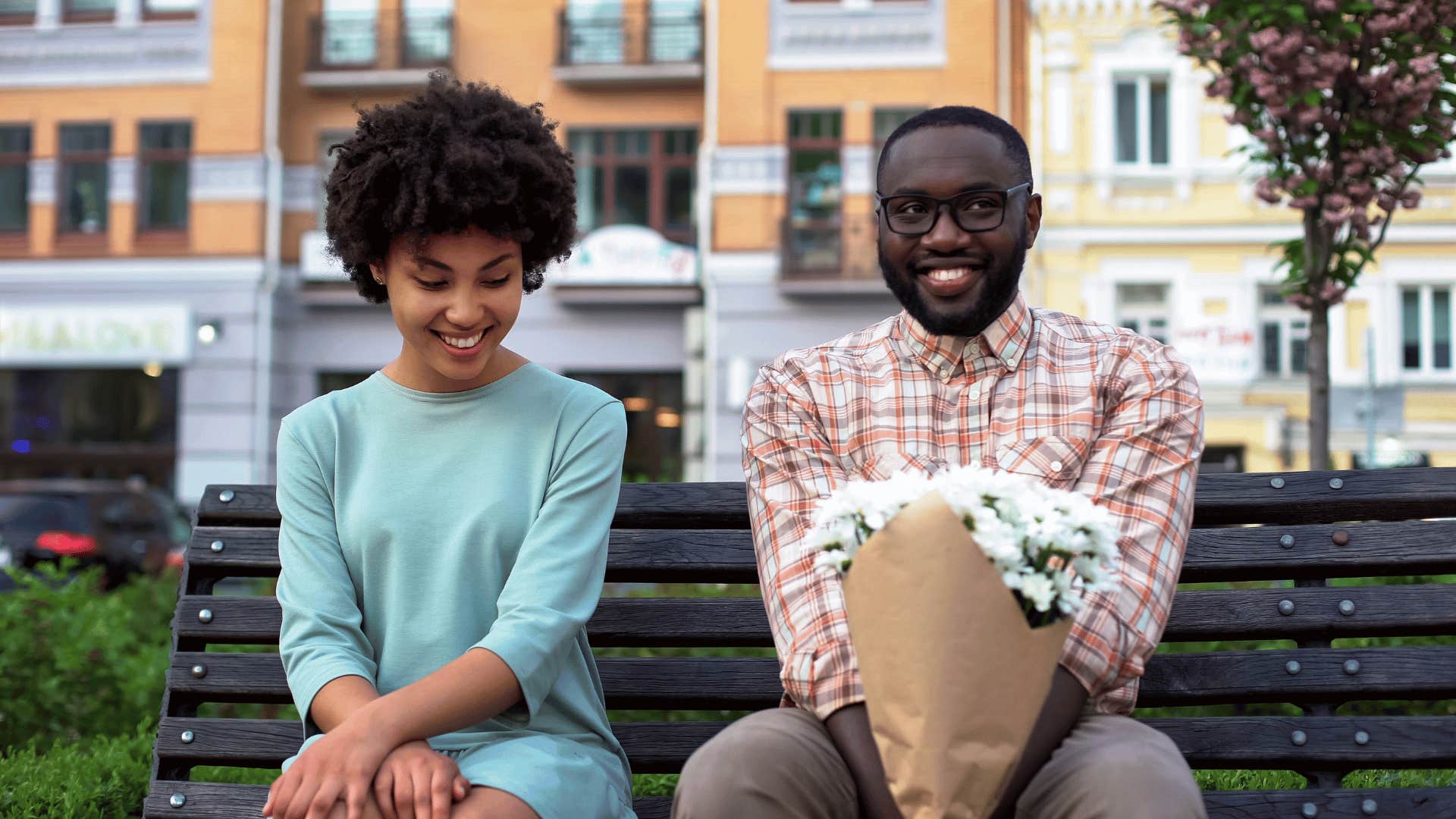 couple sitting on bench