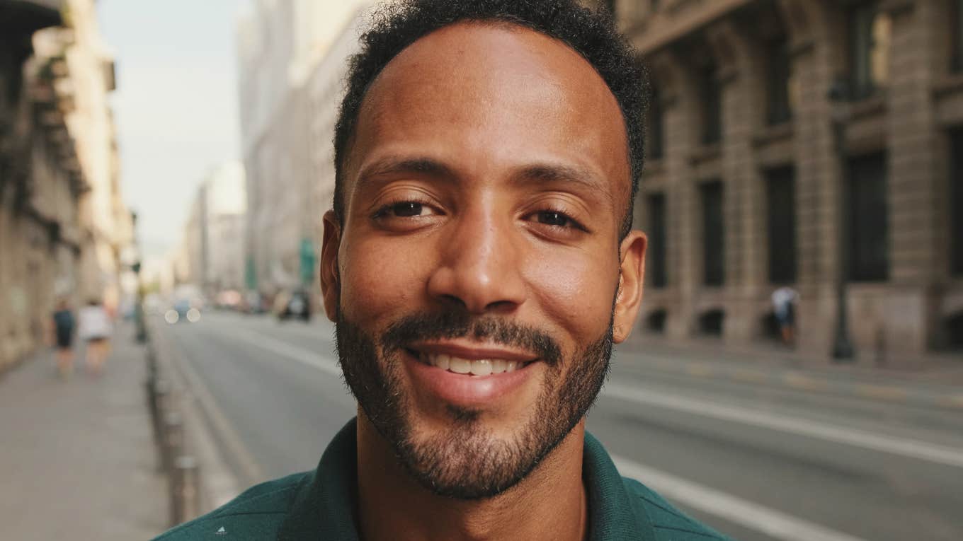 handsome smiling man on the street