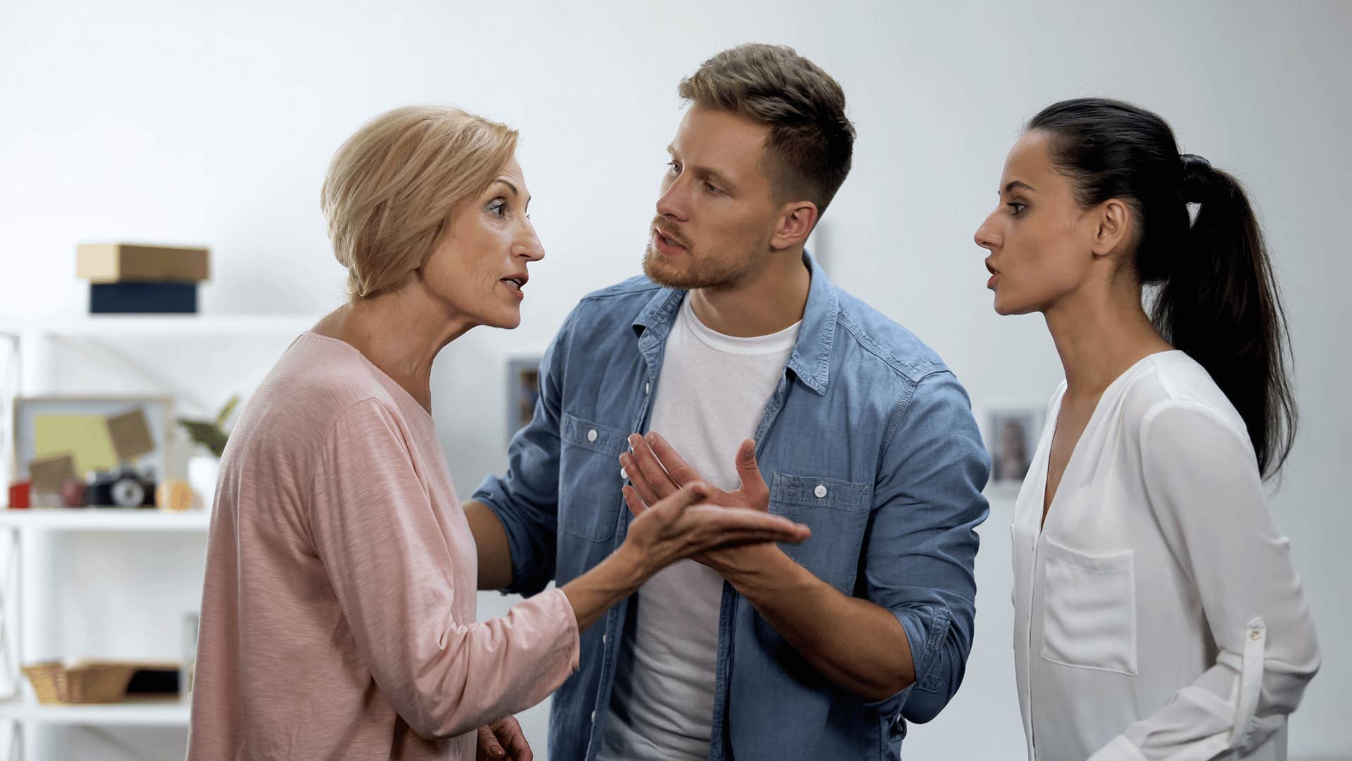 woman arguing with her son and his wife