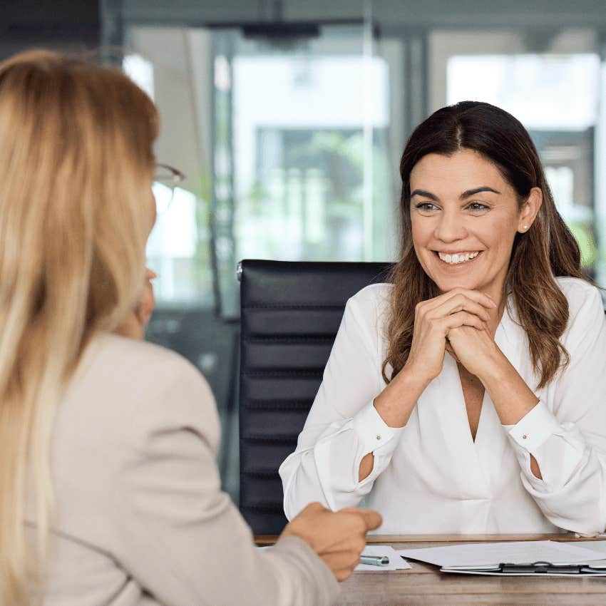 two professional women talking