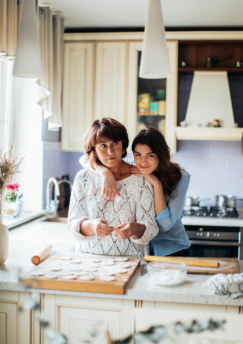 older and younger woman baking together