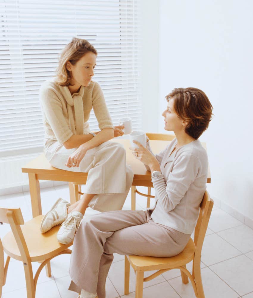 two women talking over coffee