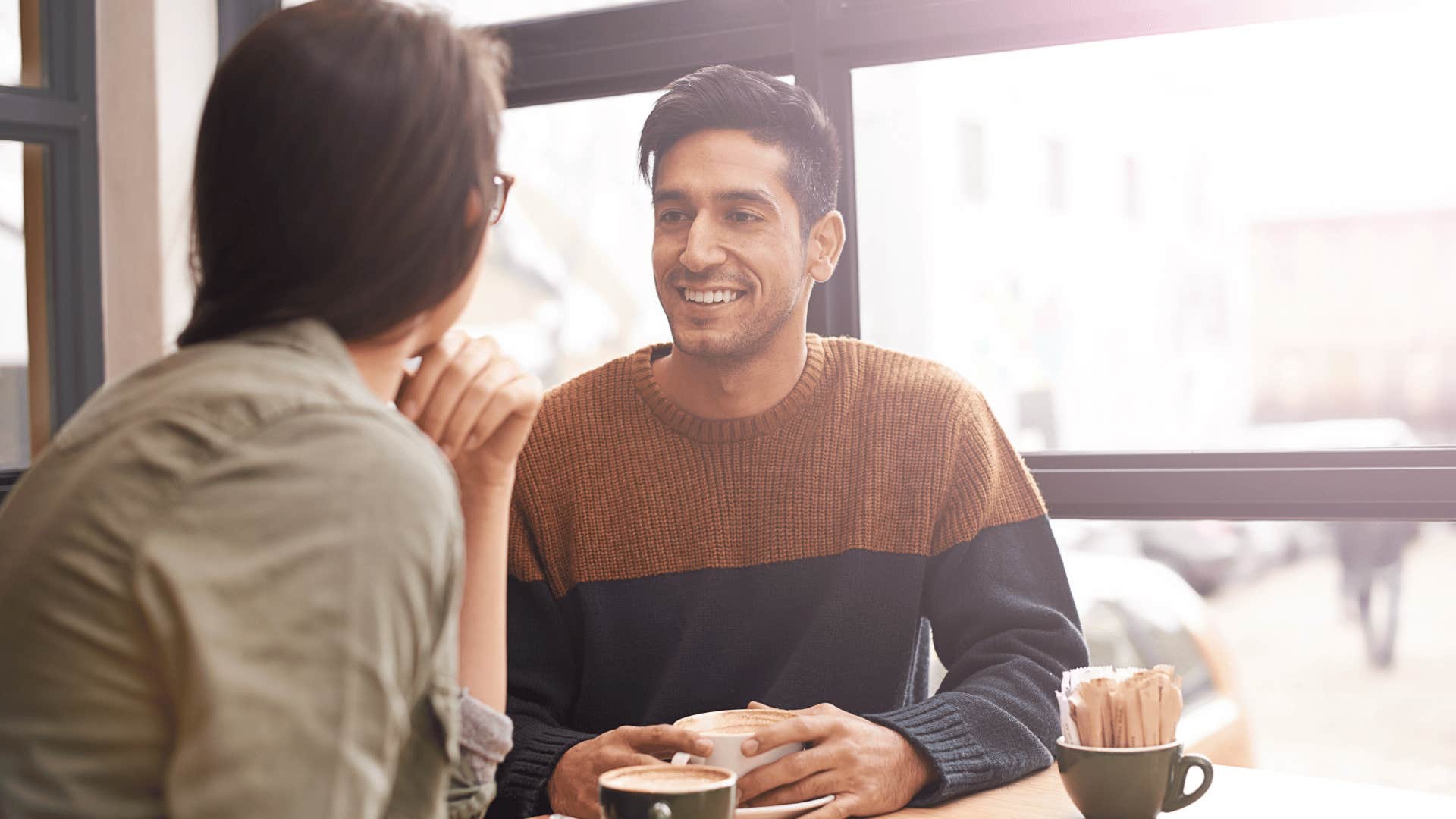 man and woman chatting