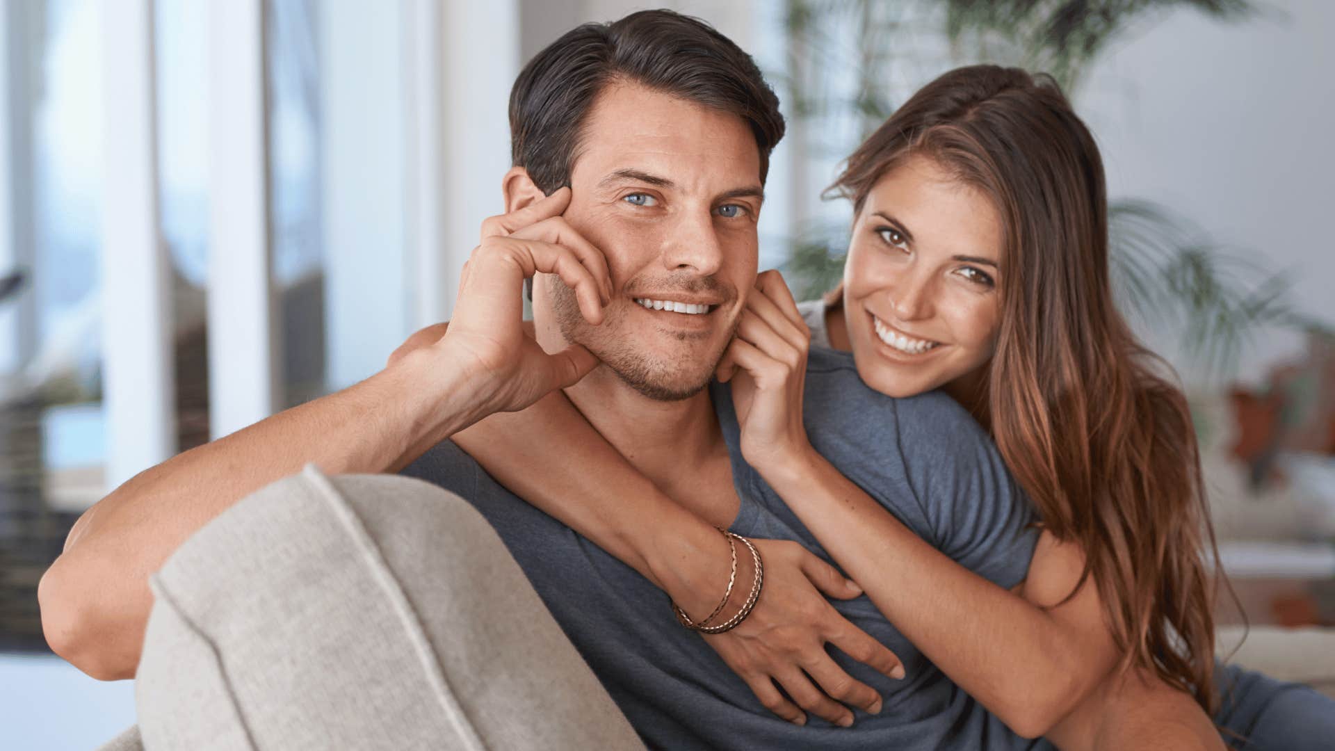 man and woman being affectionate and flirty