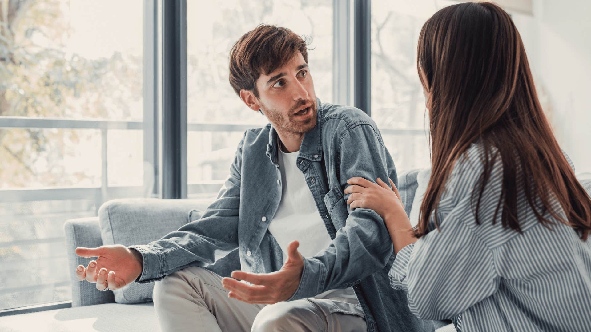 man arguing with woman