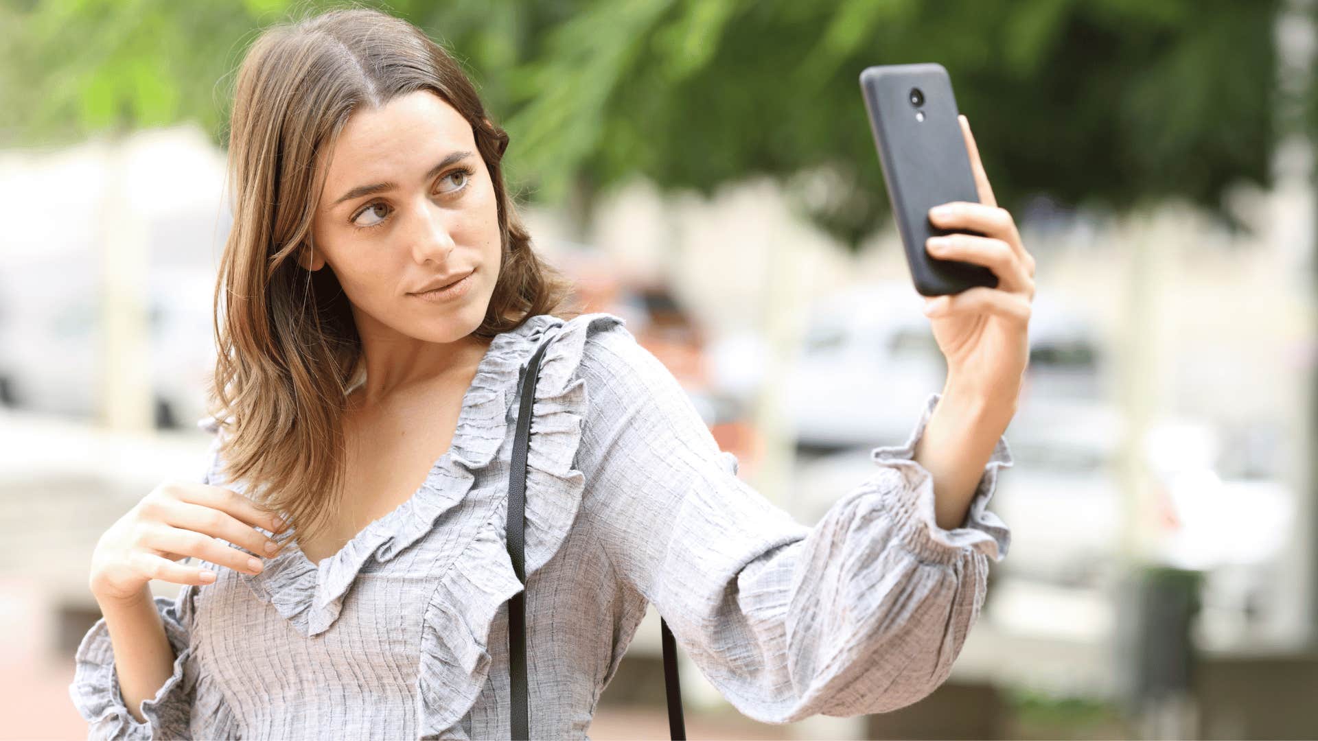 woman taking selfie