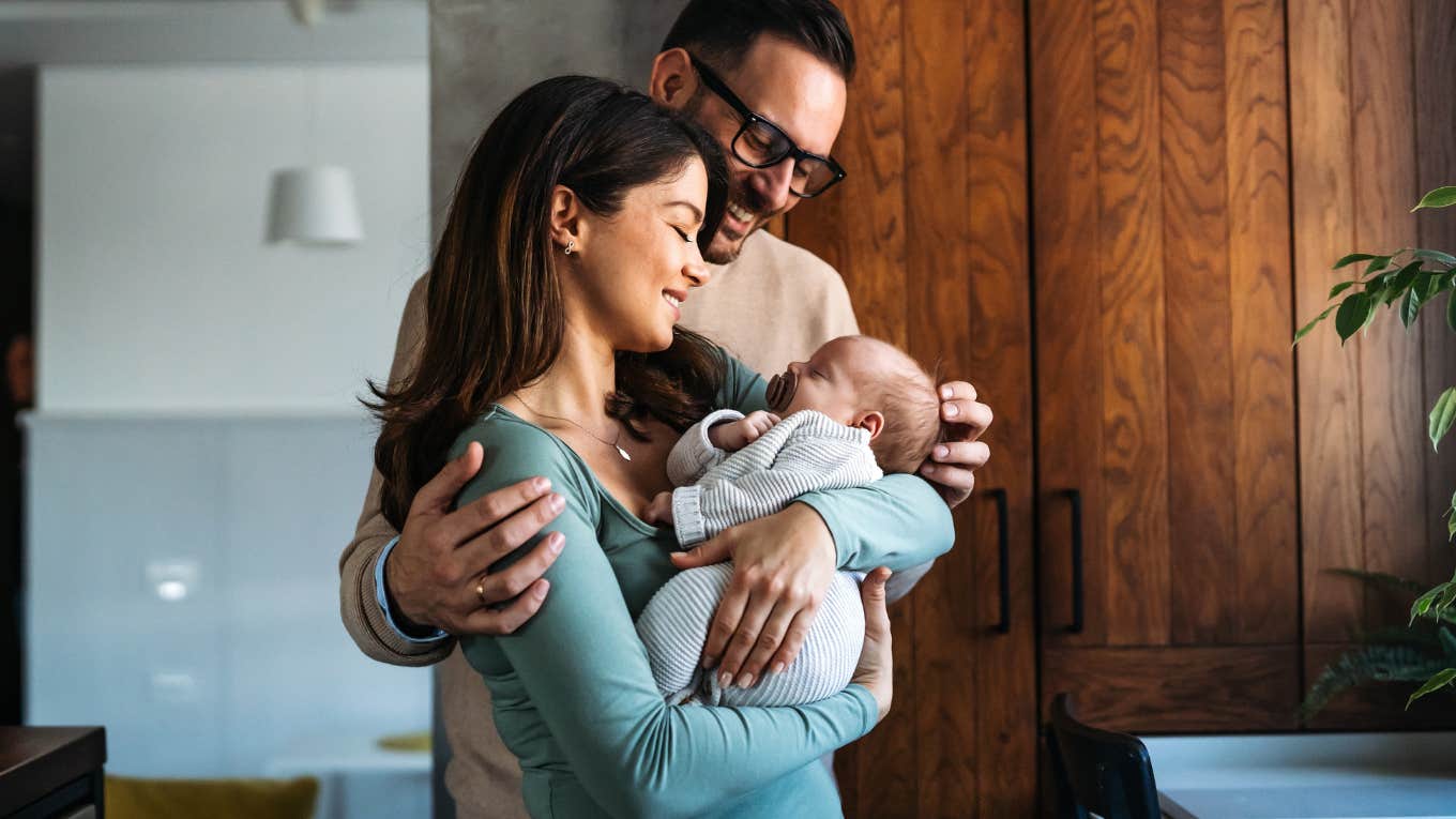 unconditional parents looking fondly at their child