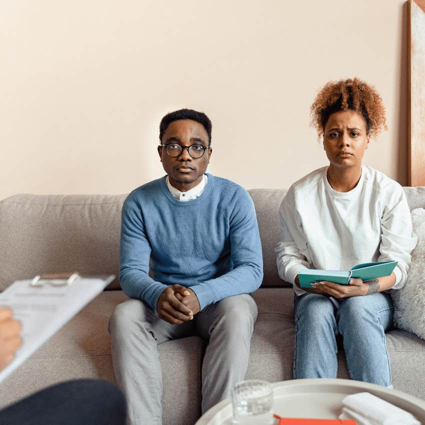 unhappy couple in couple's counseling