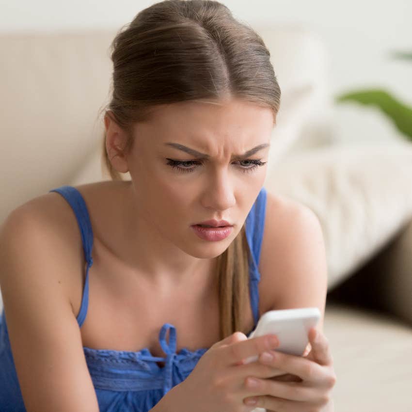 upset woman reading email from ex's therapist