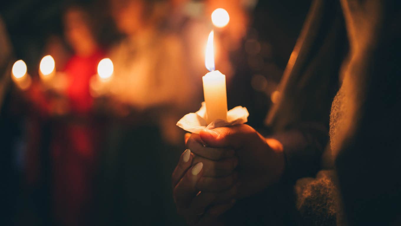 candles being held in a vigil