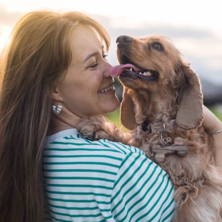 woman and cocker spaniel