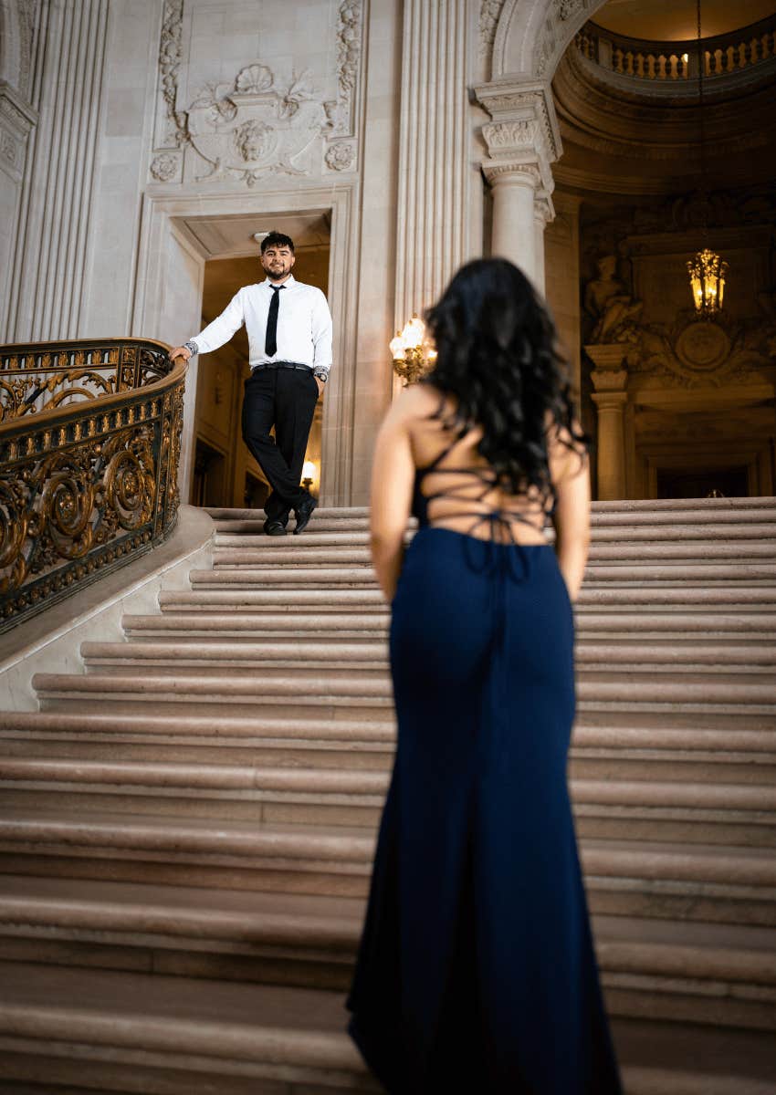 woman climbing stair to meet partner