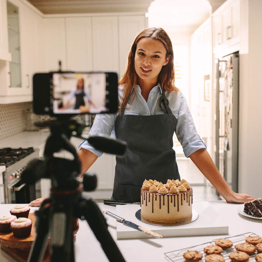 Woman recording herself cooking