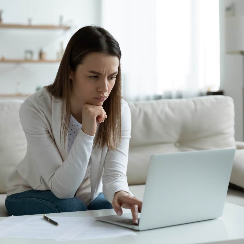 Business owner reading harsh email