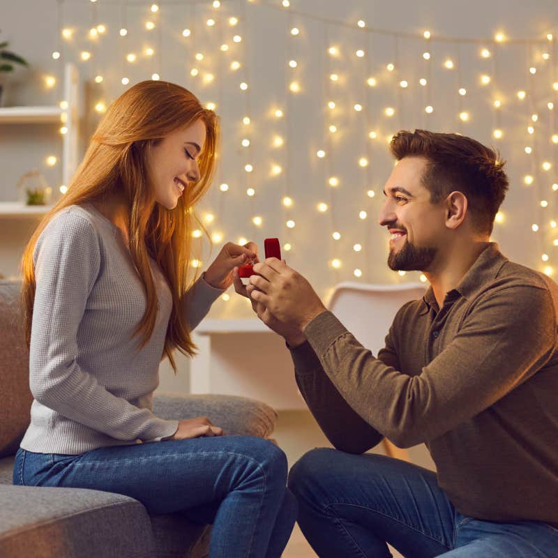 man proposing to woman with ring