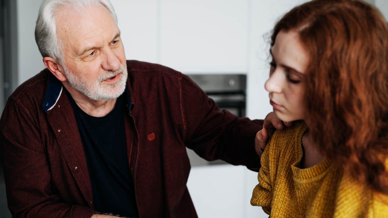 Father speaking to adult daughter.