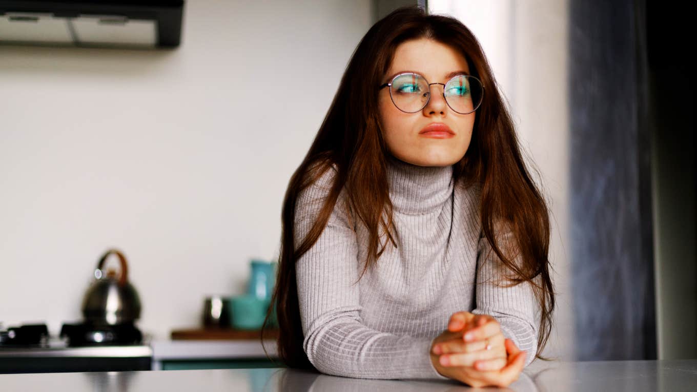 Woman reflecting on worst decisions she has made in life. 