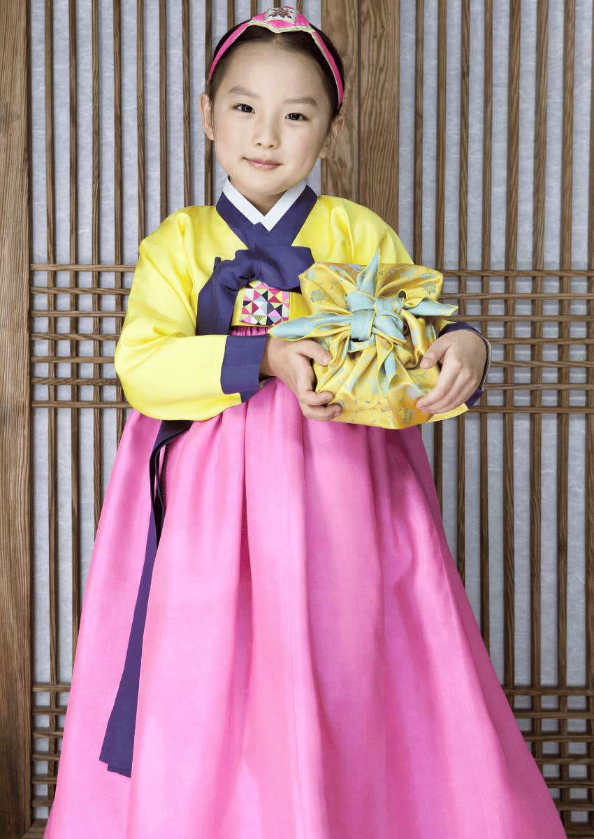 young korean girl wearing traditional clothing