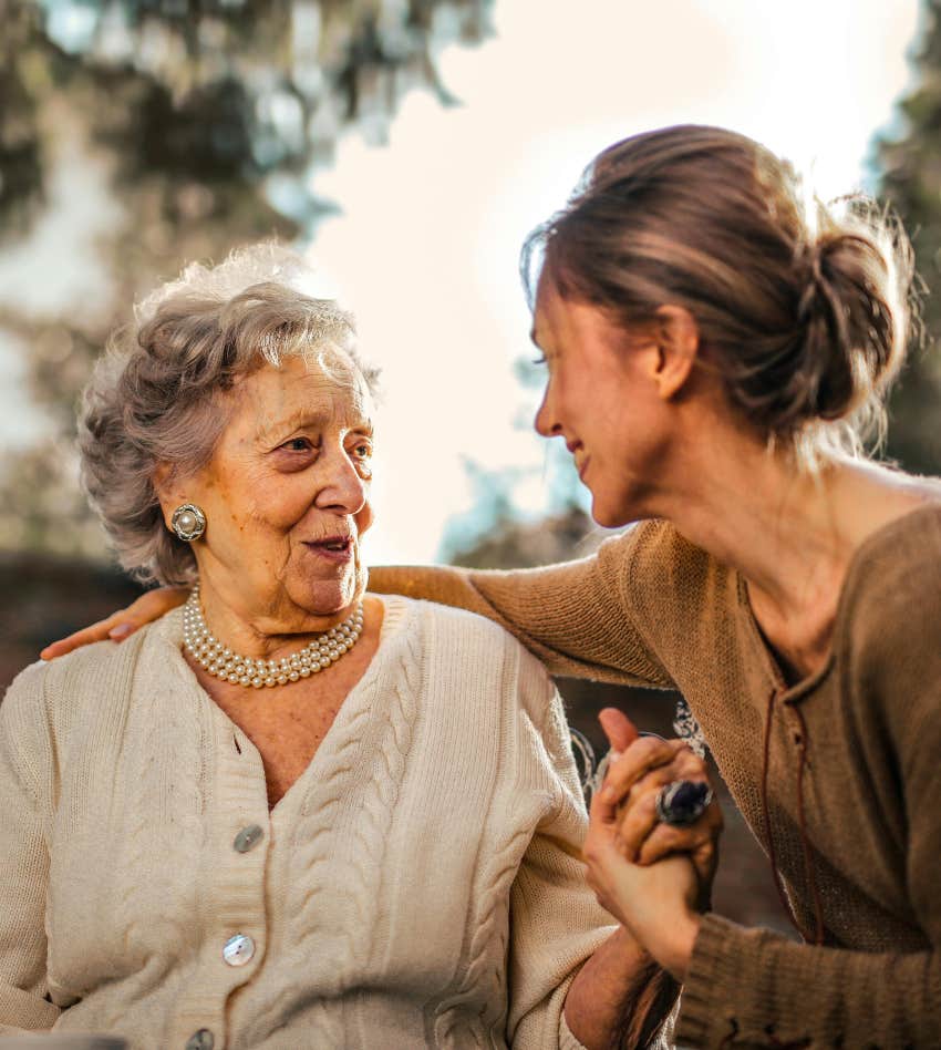 young woman caring for an elderly woman